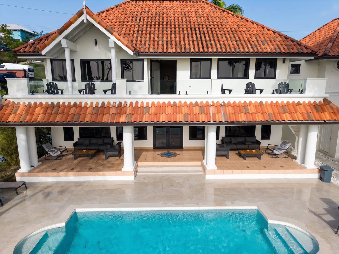 The Casa Villa in Mt Irvine, Tobago: a two-storey, 7-bedroom villa with a wraparound porch above its private pool